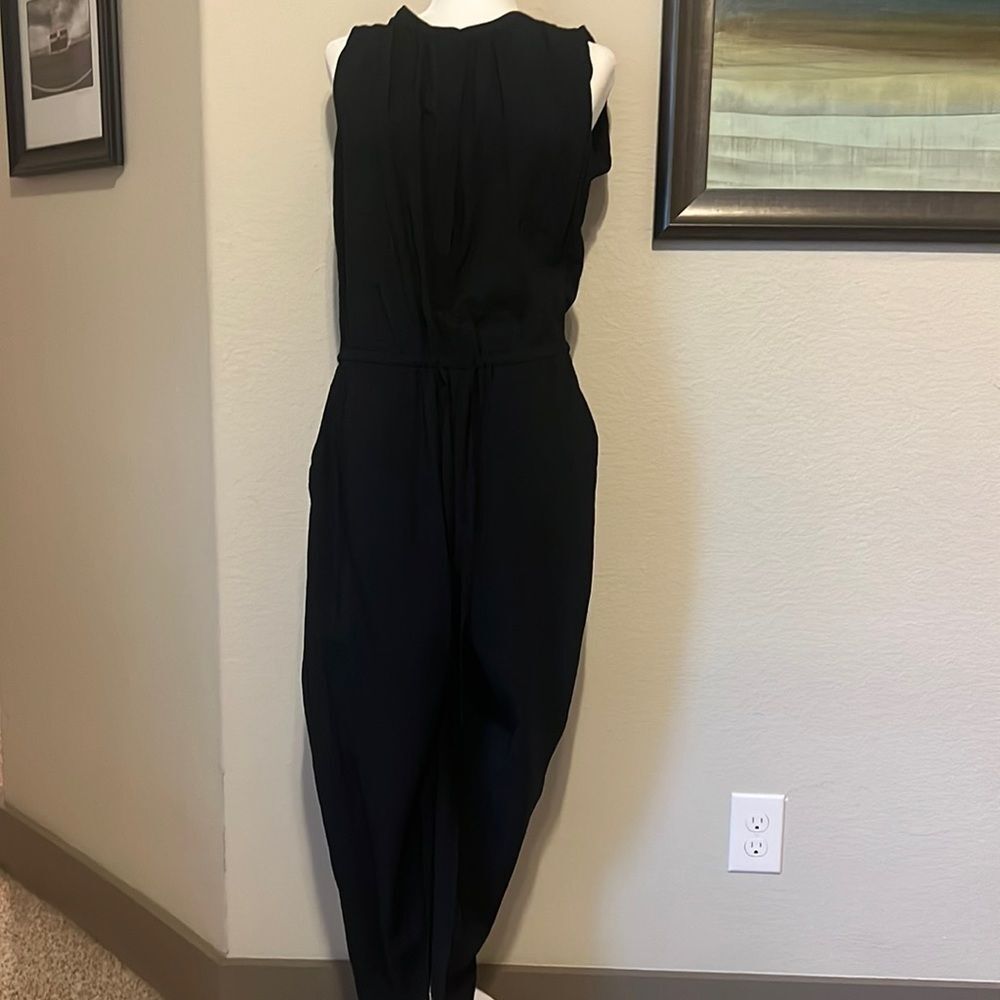 Loft Black romper and size Medium